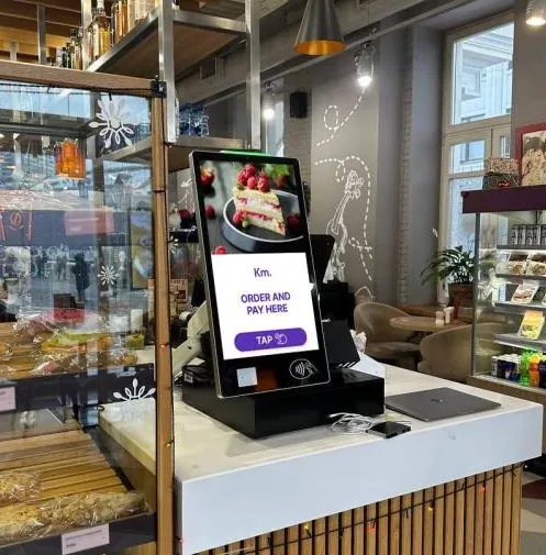 Kate One kiosk standing on a café counter